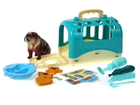 Piesek z klatką do przenoszenia z akcesoriami