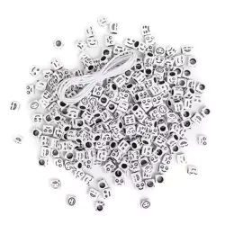 Koraliki emotikony czarne na białej bazie 40g - Dalprint